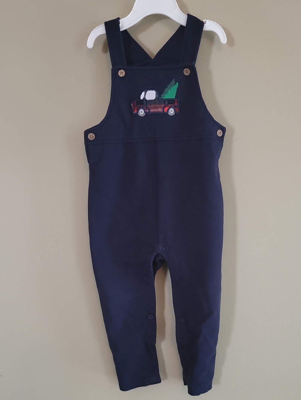 Soft navy overalls with truck appliqué